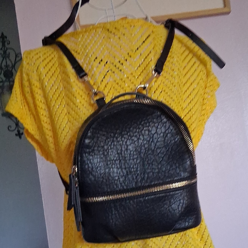 Textured Black Mini Backpack with Gold Zipper Accents. ZARA WOMAN